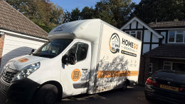 HomeGo Removals Reading branded vehicle infront of customer property during loading HomeGo Removals Reading branded vehicle infront of customer property during loading